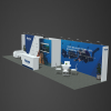 10x40 exhibit booth rental with large graphic on the wall, a white table, and a desk with a tv behind it
