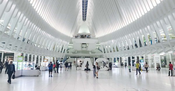 People walking around in an exhibition center